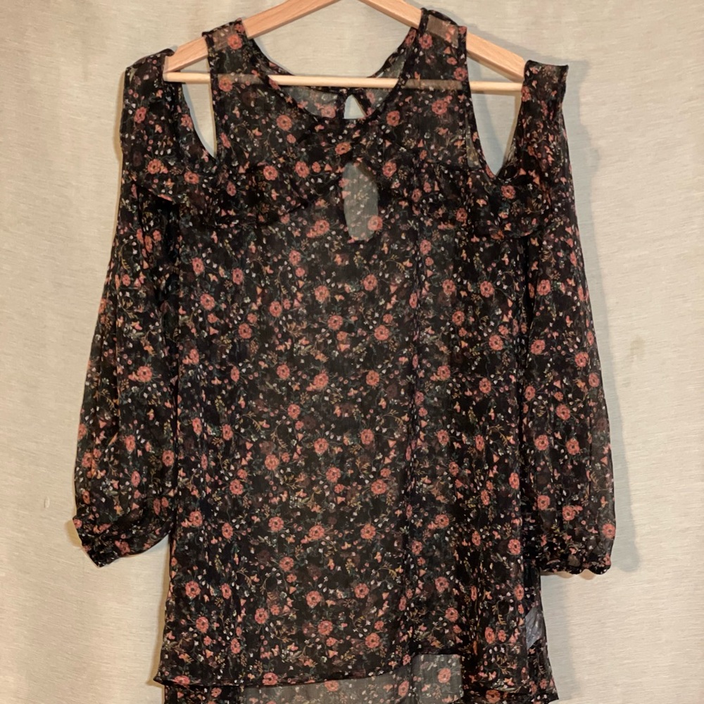 Sheer black cold-shoulder top with frill embellished collar and dusty rose print